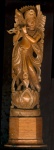 Player of restored flute statue. 