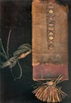 Ancient restored leather book. (ink writing on pages.) 