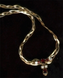 three-gold-pendentive-diamond-pearls
